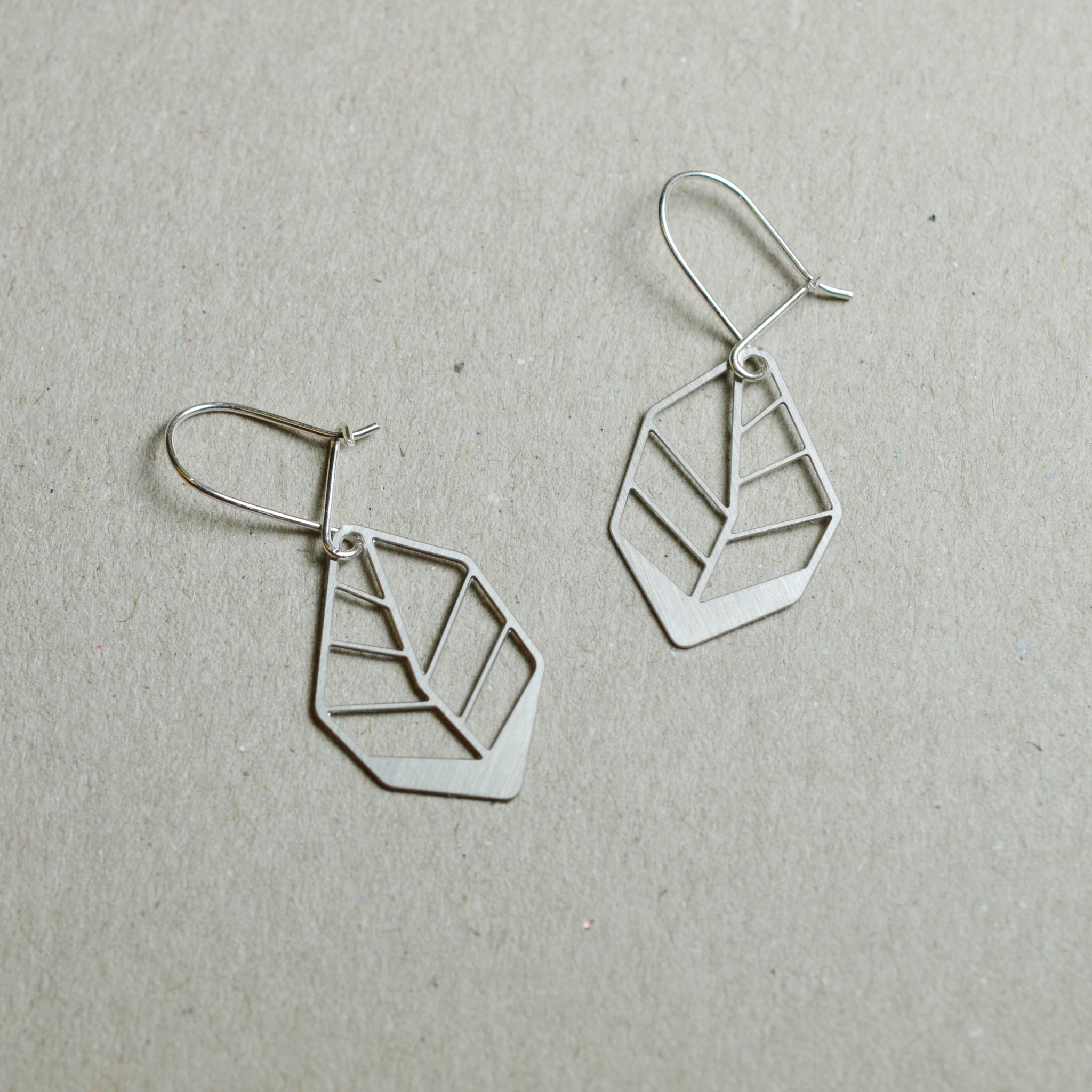 Hoja: Small abstract steel leaf earrings